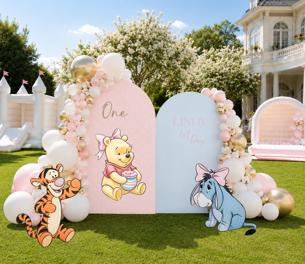 Pastel pink and blue Honey Bear backdrop and character cutouts for a whimsical first birthday celebration.