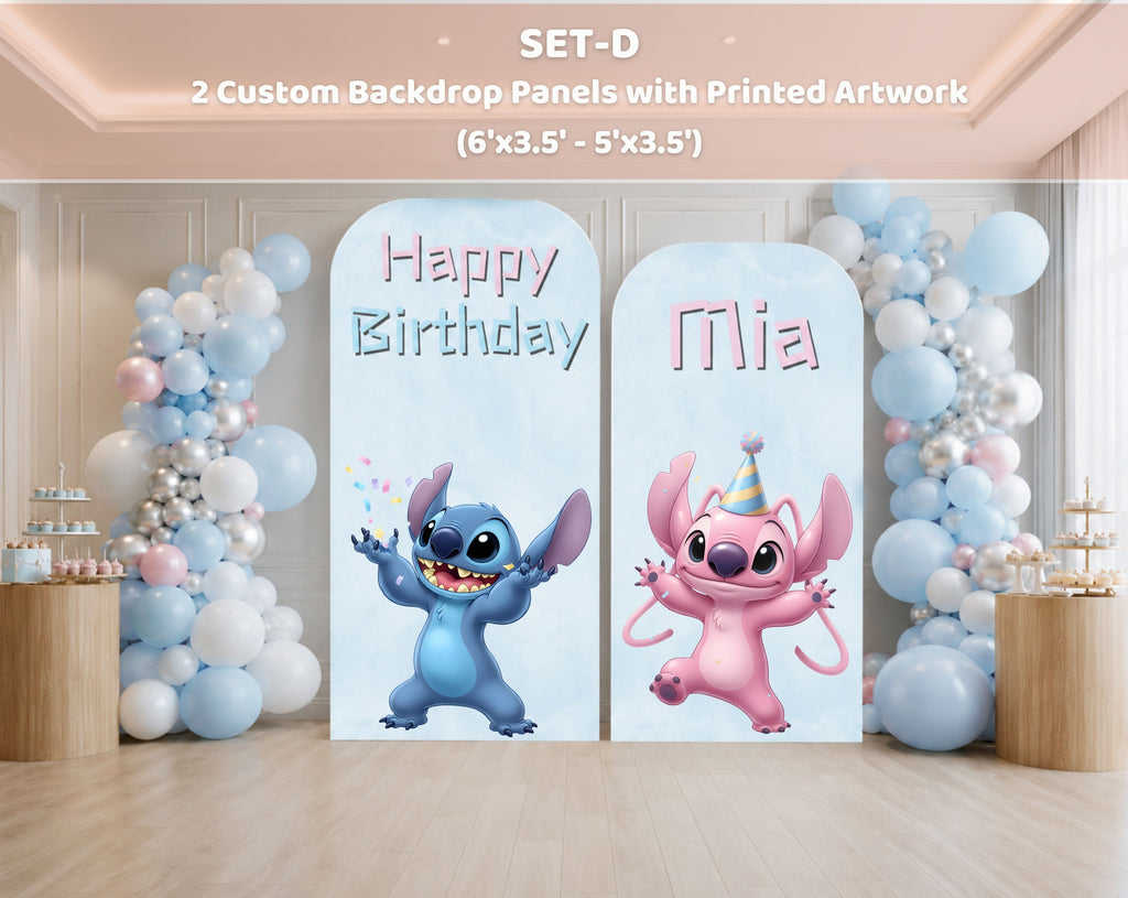 Personalized blue alien birthday backdrop with soft pink and blue balloons, pastel panels and character decorations indoors.