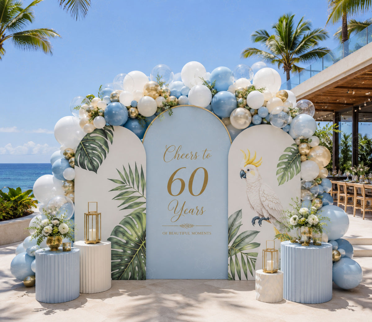 Blue and white tropical bird backdrop with parrots and elegant outdoor birthday party decorations
