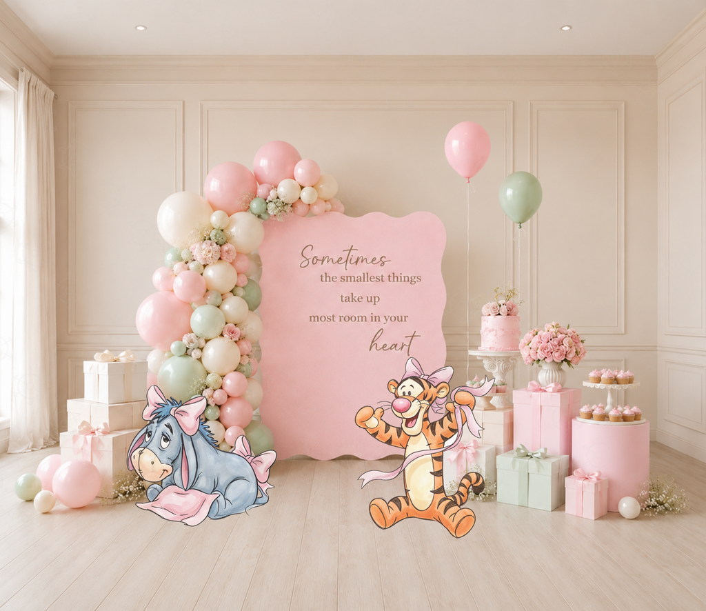 Pastel Honey Bear baby shower backdrop with coordinating character cutouts and soft pink floral decorations.