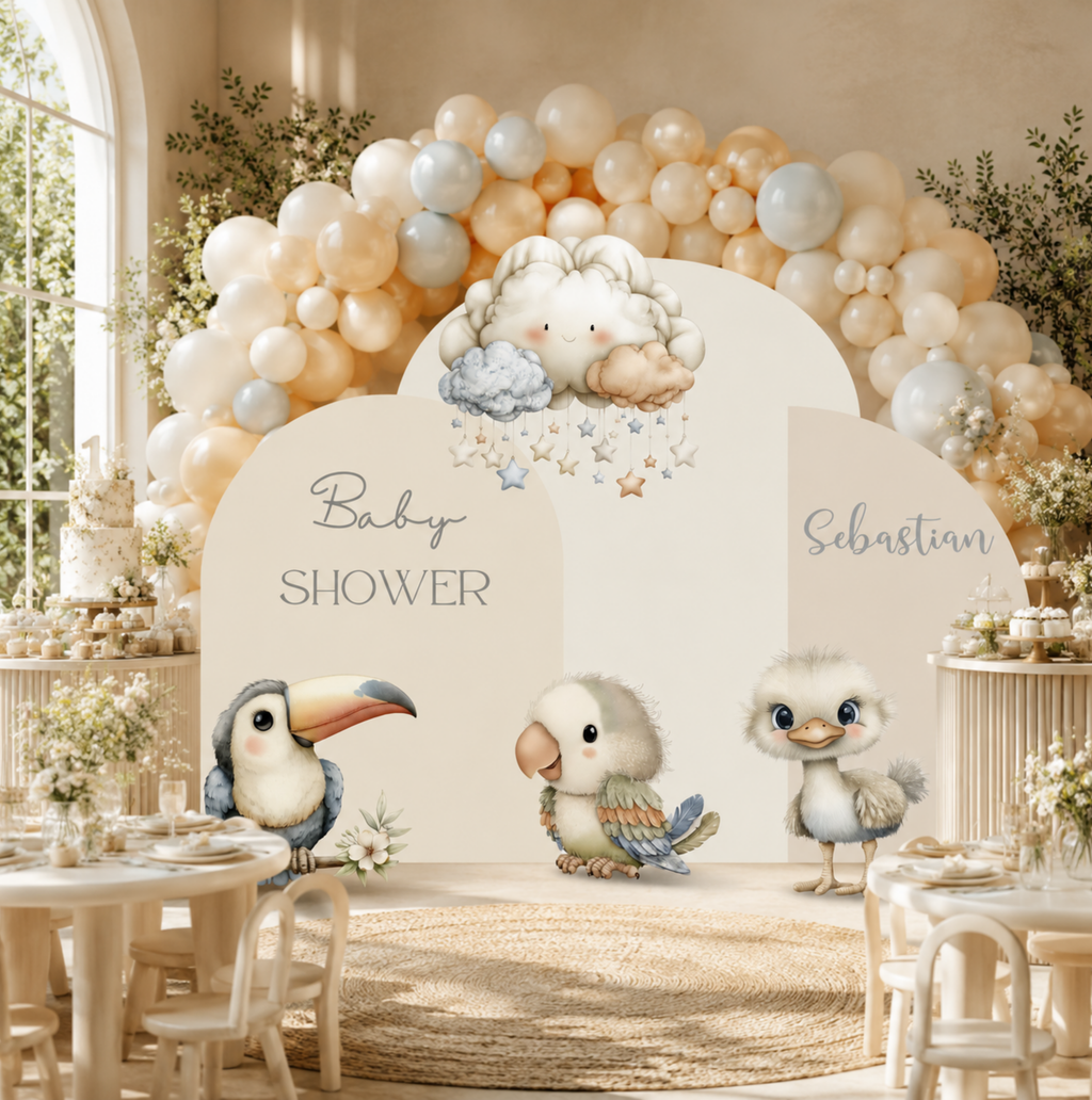 Personalized safari party backdrop with neutral balloon garland, animal cutouts and custom name sign for an elegant jungle celebration.