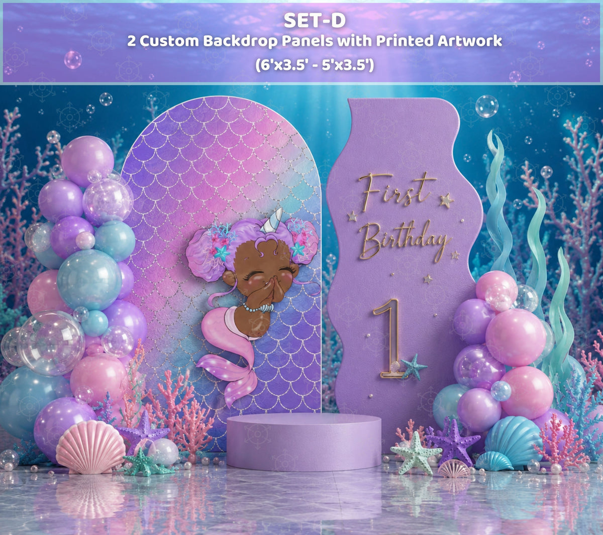 Pastel little mermaid first birthday setup with personalized green panel and coordinated ocean decorations
