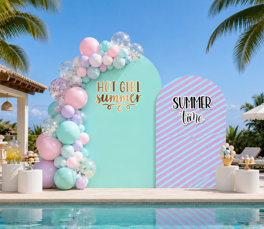 Personalized summer birthday backdrop with bright green blue and coral panels, pool floats and tropical party decorations.