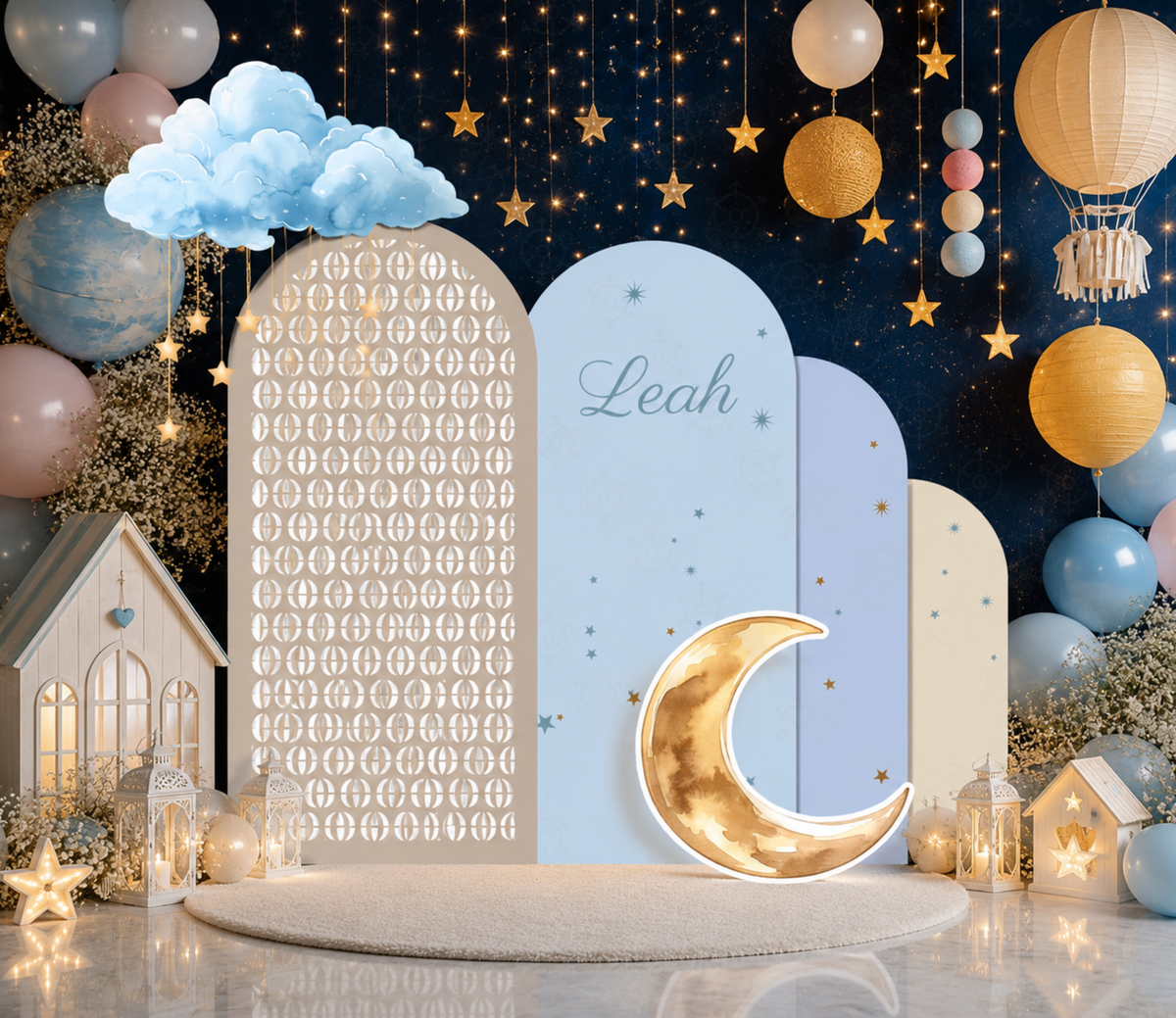 Navy and gold celestial baby shower backdrop with crescent moon, clouds, stars and elegant Heaven Sent decorations for a baby boy.
