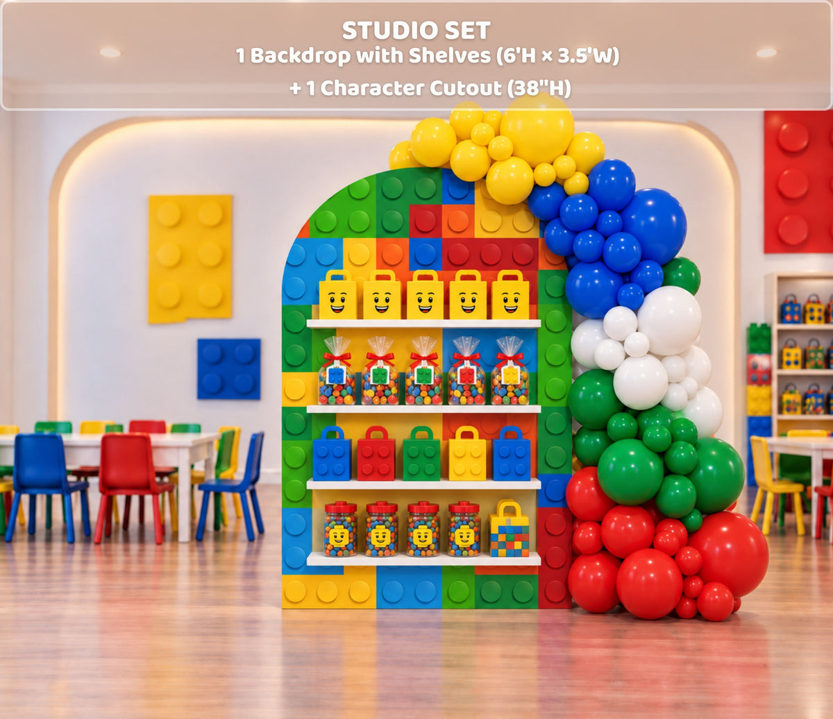Building block birthday shelf backdrop with red yellow blue and green accents, colorful balloons and party favor display.