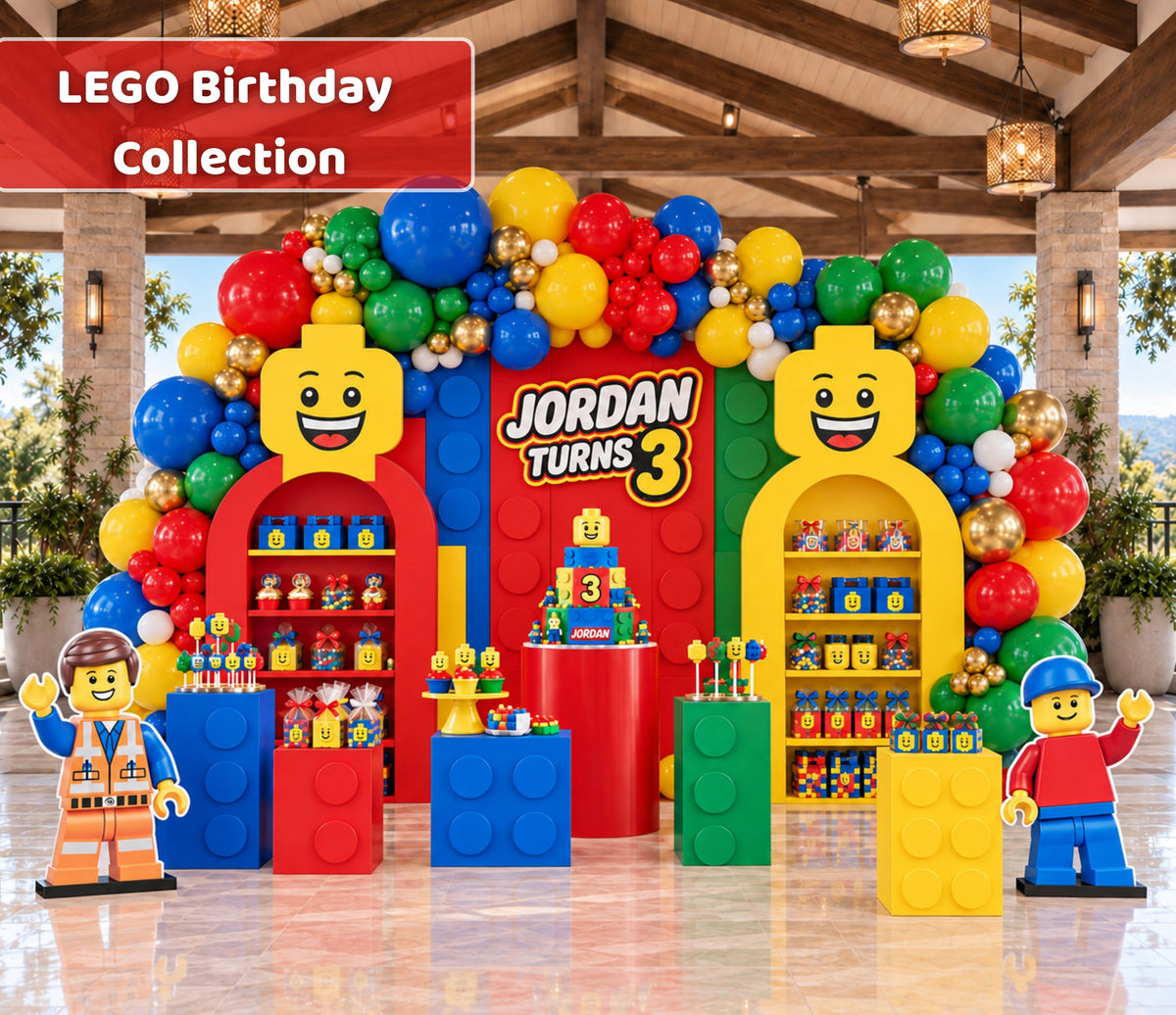 Personalized building block birthday backdrop with bright red yellow blue and green panels, balloon garland and colorful brick inspired party decor.