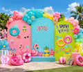 Personalized summer pool party backdrop with coral, aqua and lime arch panels, colorful balloons, flamingo floats and tropical birthday decorations.