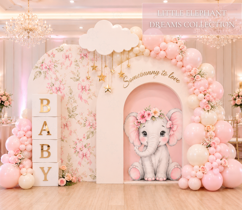 Personalized pink baby elephant backdrop and cutouts with floral balloons and BABY blocks for a sweet baby celebration.