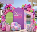 Personalized teen girl birthday backdrop with bright pink and green arch panels, colorful balloon garland and trendy photo booth party decor.