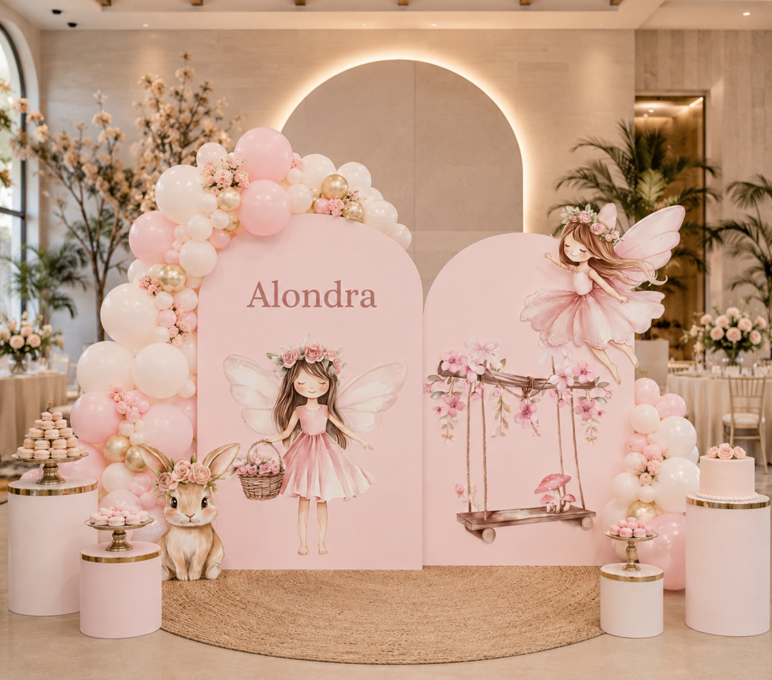 Personalized fairy birthday backdrop with blush pink panels, soft flowers and magical garden themed party decorations.