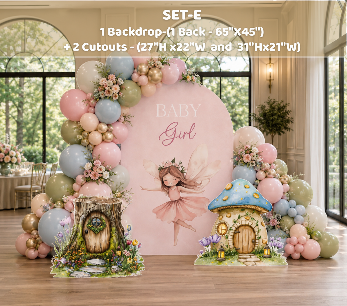 Enchanted garden fairy backdrop with blush pink panels, floral arch details and pastel birthday decorations for a girls party.