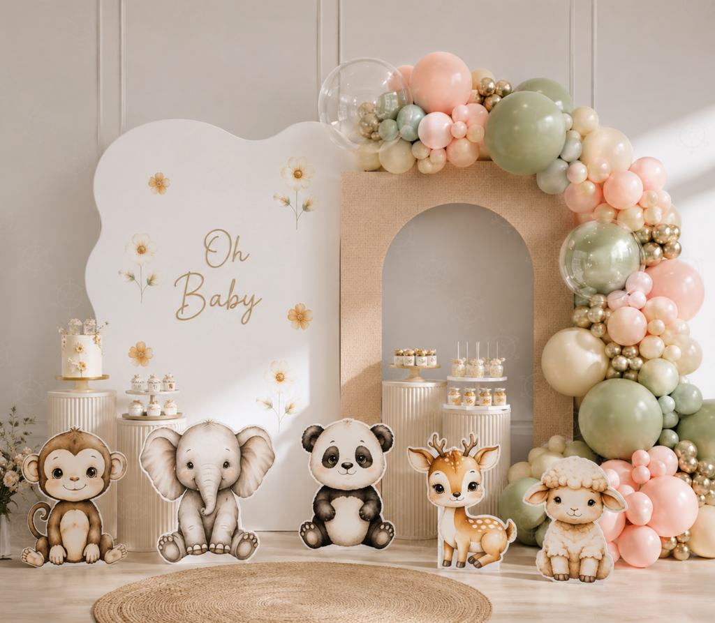 Neutral little animal friends backdrop with pastel balloons and woodland animal cutouts for a baby celebration