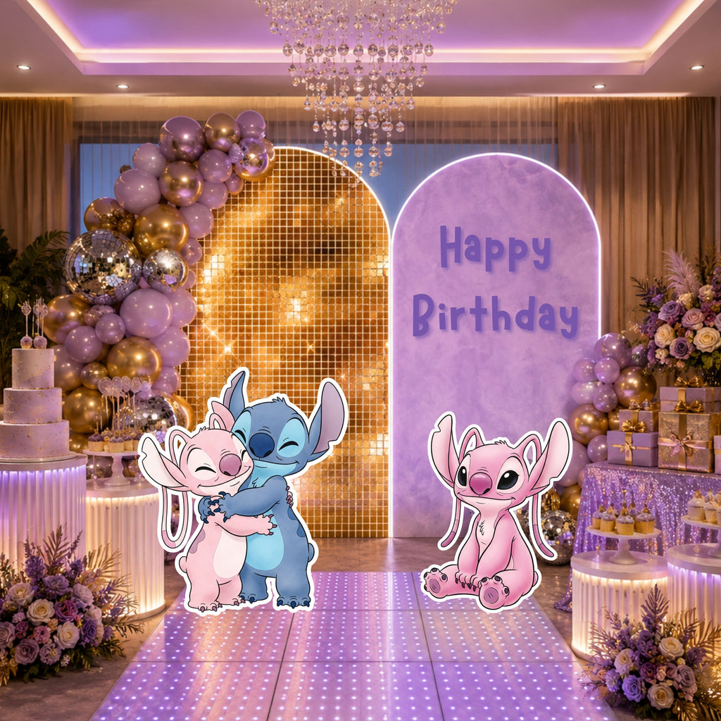 Lavender blue alien birthday party backdrop with tropical palm details, personalized Happy Birthday sign and coordinating character cutouts.