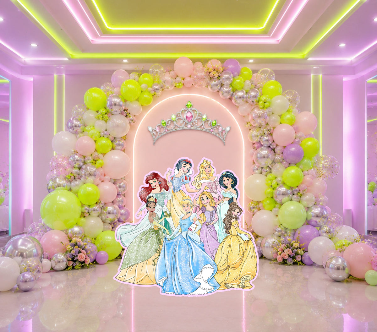 Pink princess birthday backdrop with pastel balloons, arched panel design and princess cutouts for a custom girls birthday setup.
