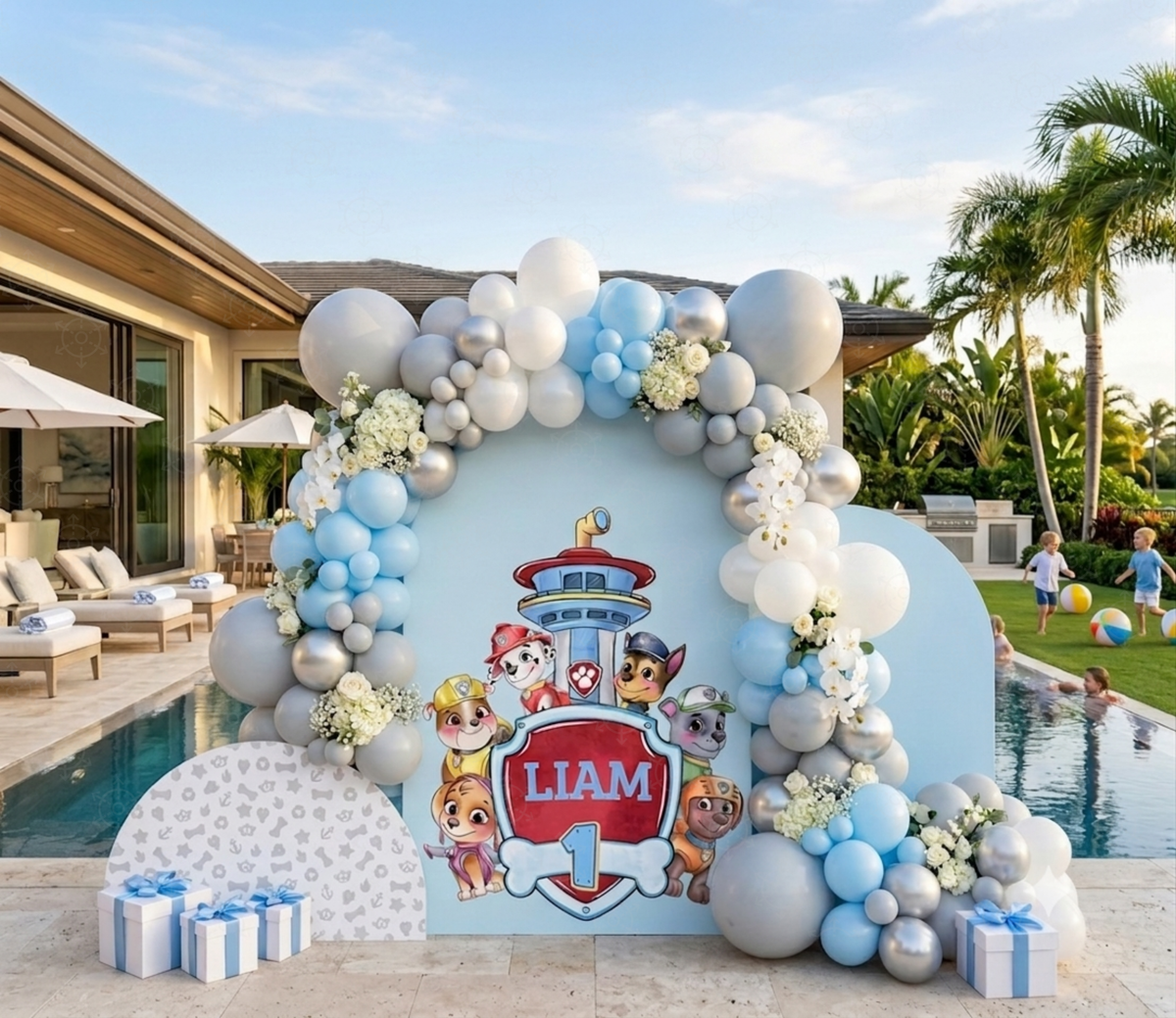 Personalized puppy birthday backdrop and cutouts displayed at an outdoor celebration