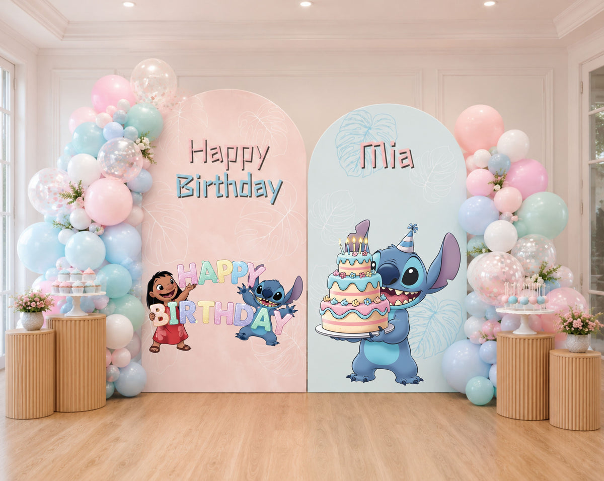 Personalized blue alien birthday backdrop with soft blue panel, pastel balloons and coordinated character decorations indoors.