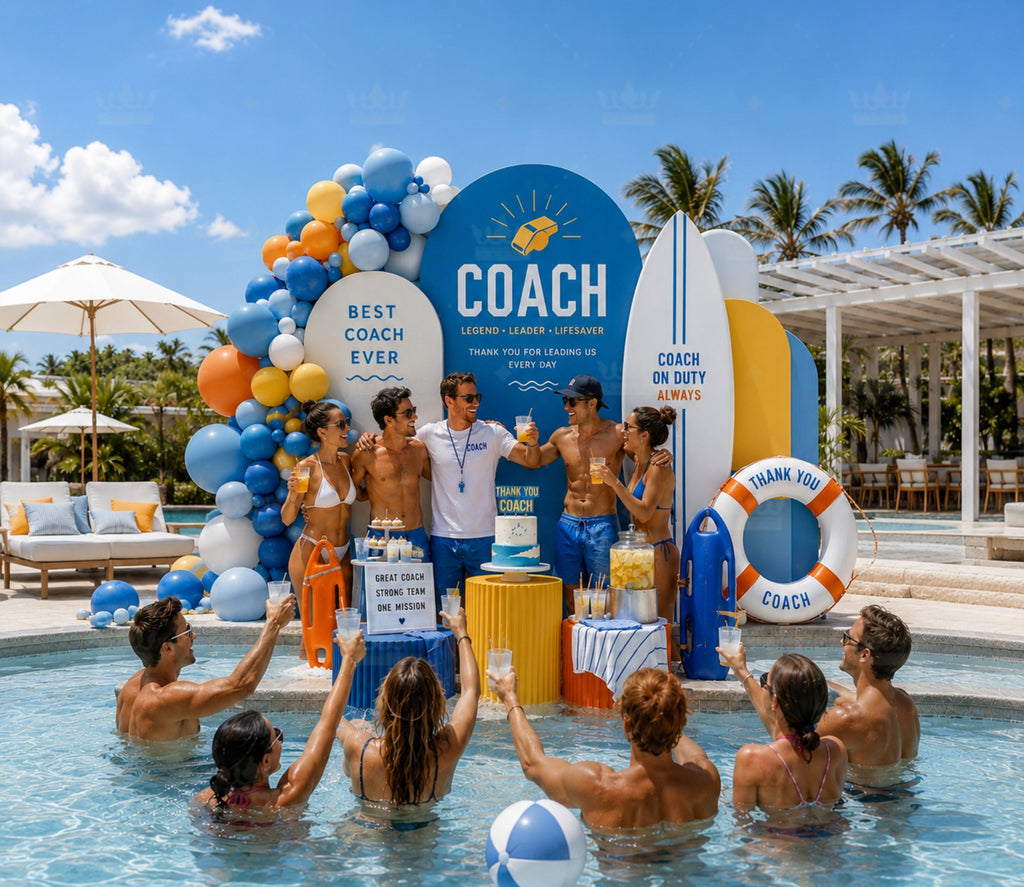 Blue personalized birthday backdrop with tropical summer decor for a boys poolside celebration