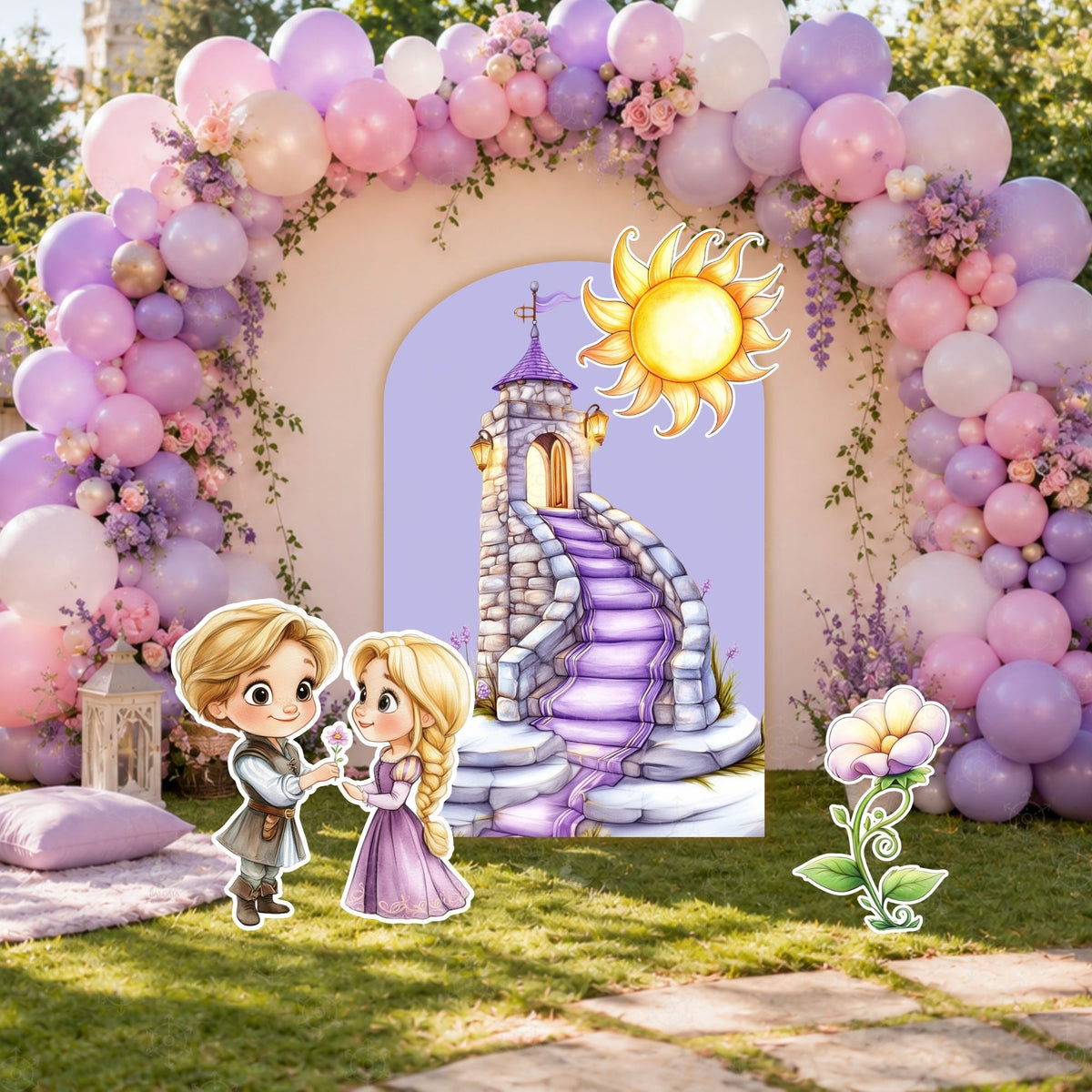 Outdoor princess party backdrop with balloon garland, floral accents and long hair princess cutouts for a dreamy birthday display.