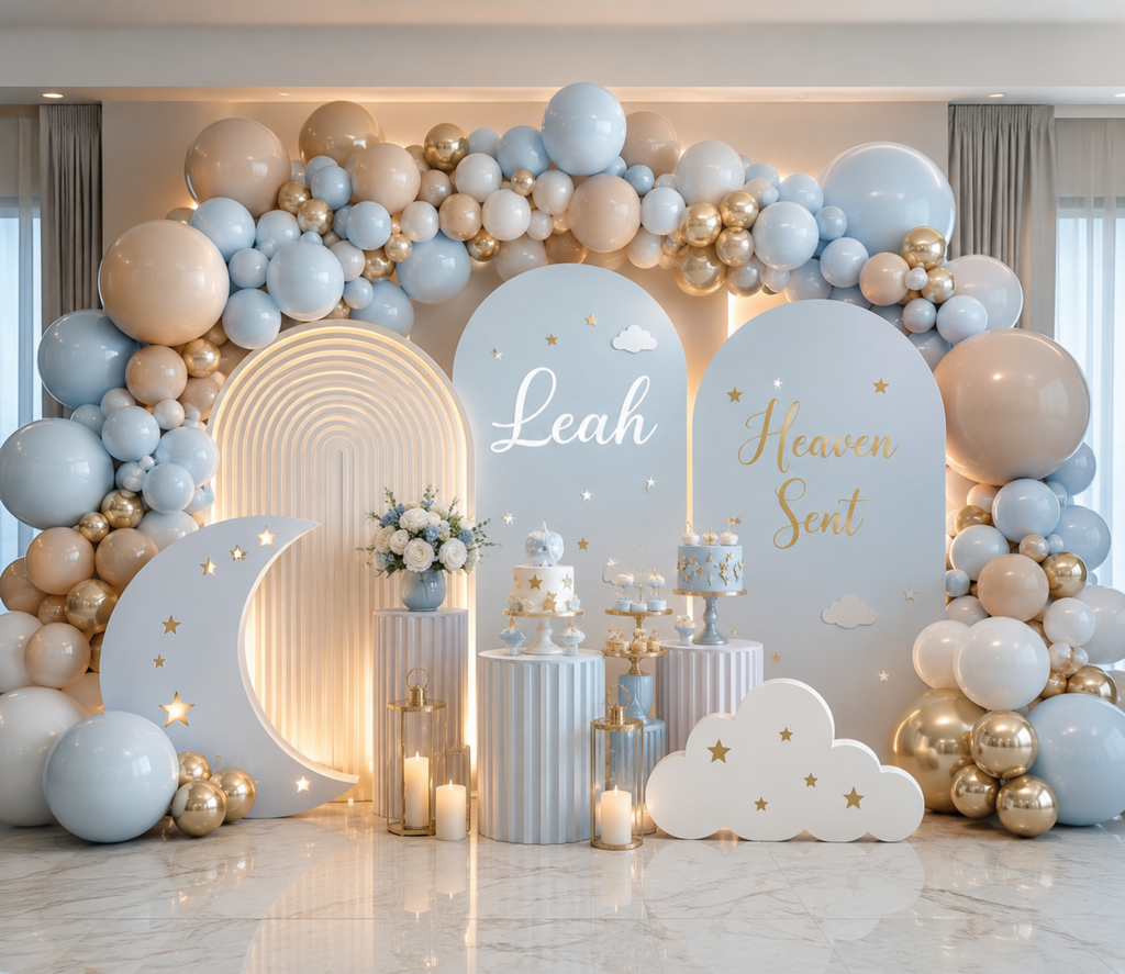 Heaven Sent baby shower backdrop with layered blue arch panels, crescent moon cutout and blue beige balloon decorations.