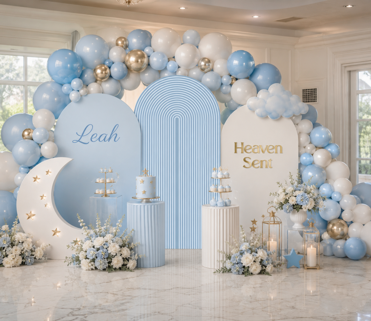 Personalized celestial baby shower backdrop with soft blue panels, cloud accents, moon cutout and neutral balloon garland for a baby boy.