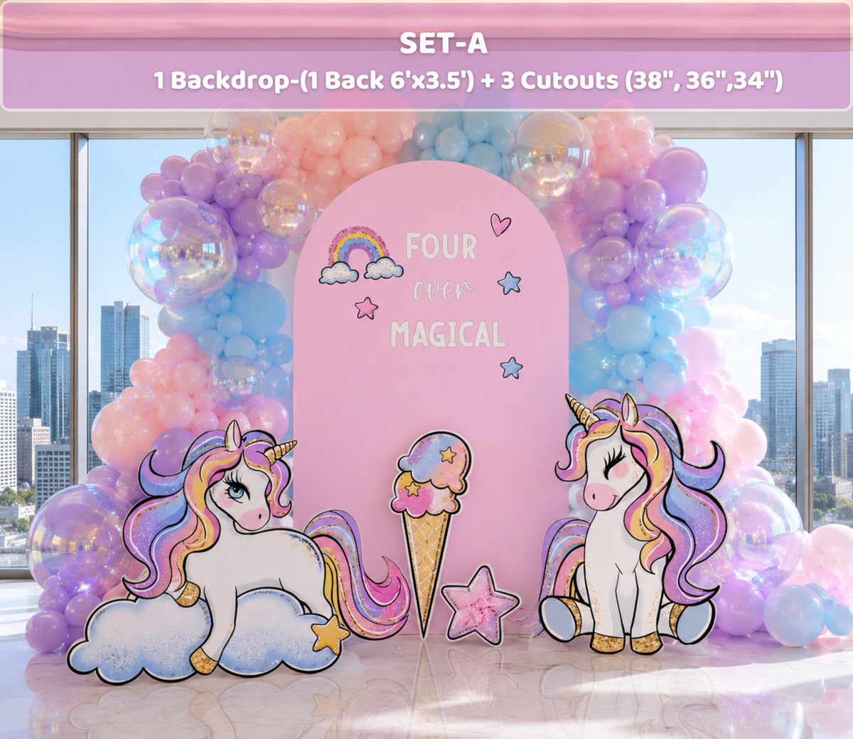Pink unicorn birthday backdrop with pastel balloon garland, rainbow arch and matching unicorn cutouts for a personalized girls party.