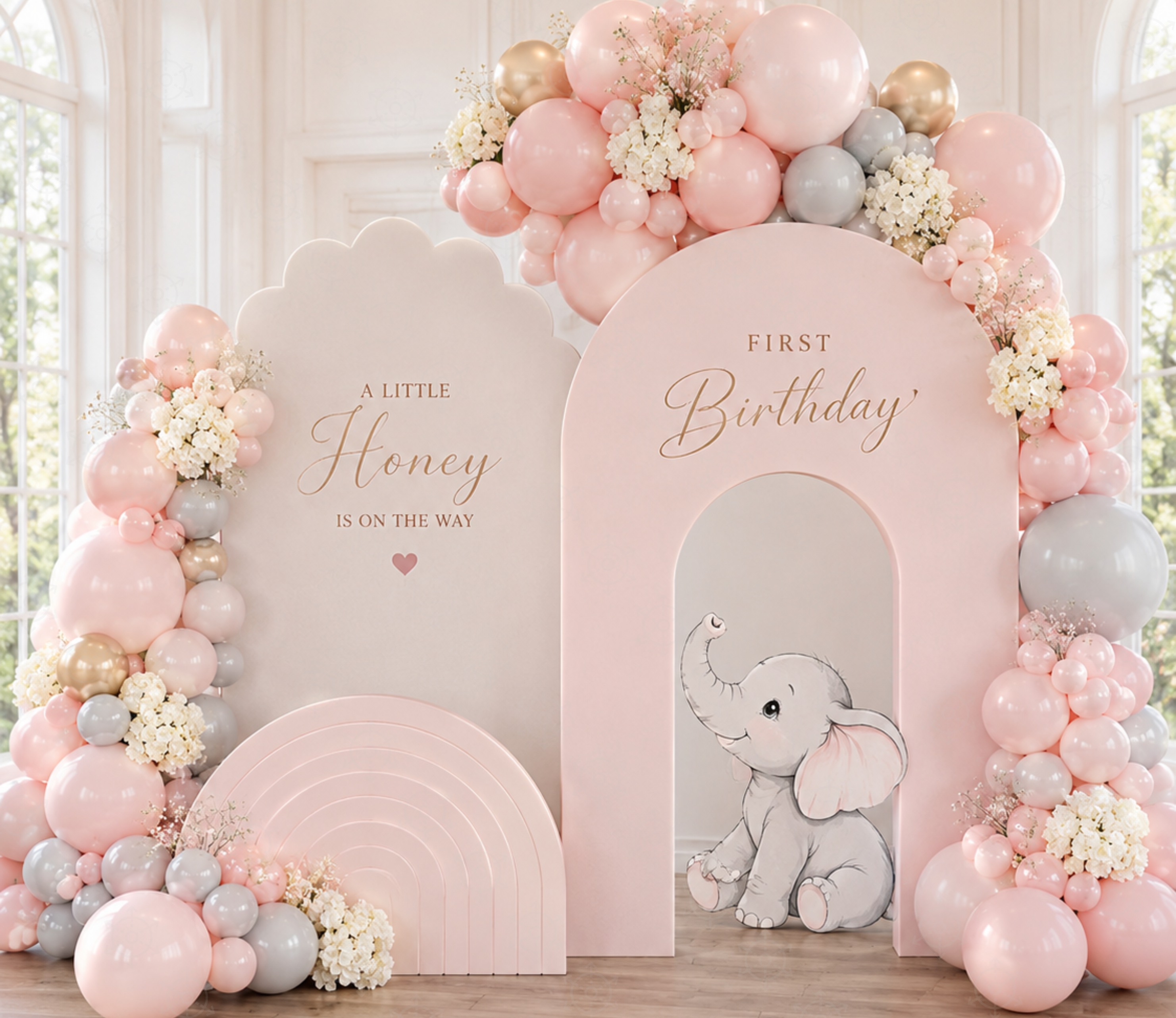 Personalized pink baby elephant backdrop and cutouts with elegant floral arrangements for a baptism or baby shower.