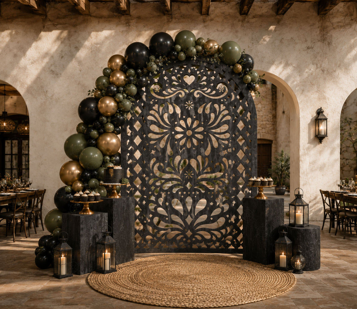 Dark Mexican inspired fiesta backdrop with intricate floral pattern and elegant event styling