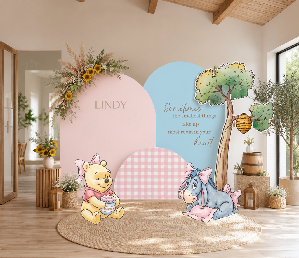 Personalized pastel storybook backdrop with Honey Bear character cutouts and soft floral party decorations.
