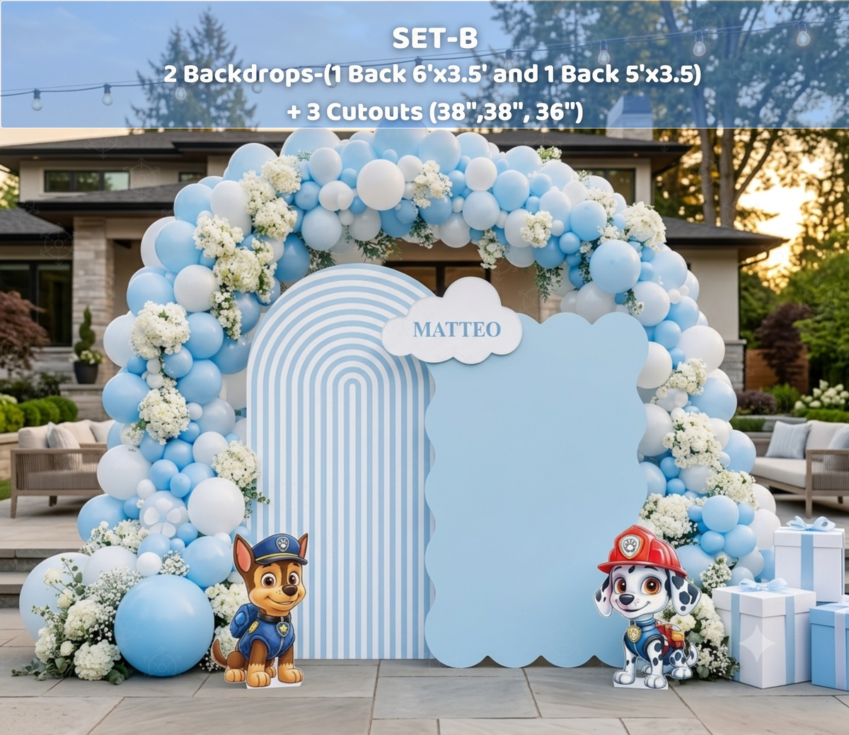 Personalized blue puppy birthday backdrop surrounded by blue and white balloon garland
