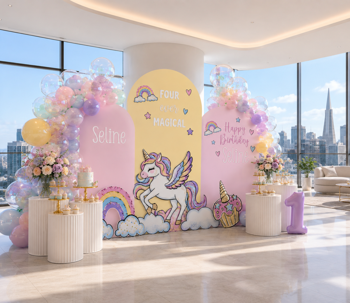 Colorful unicorn party setup with yellow pink and lavender backdrop panels, rainbow accents and pastel birthday decorations.