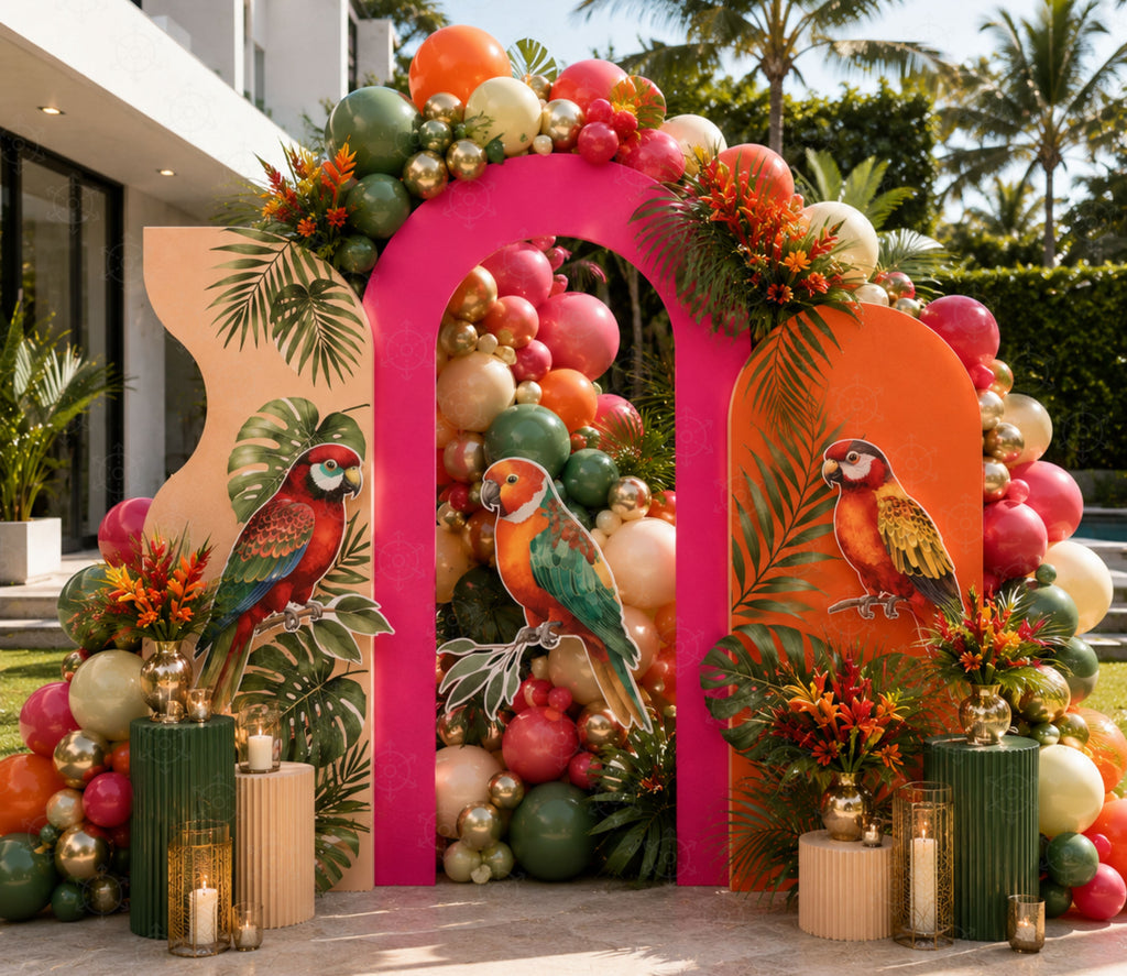 Colorful tropical bird birthday backdrop with parrots, floral balloons and personalized party decor