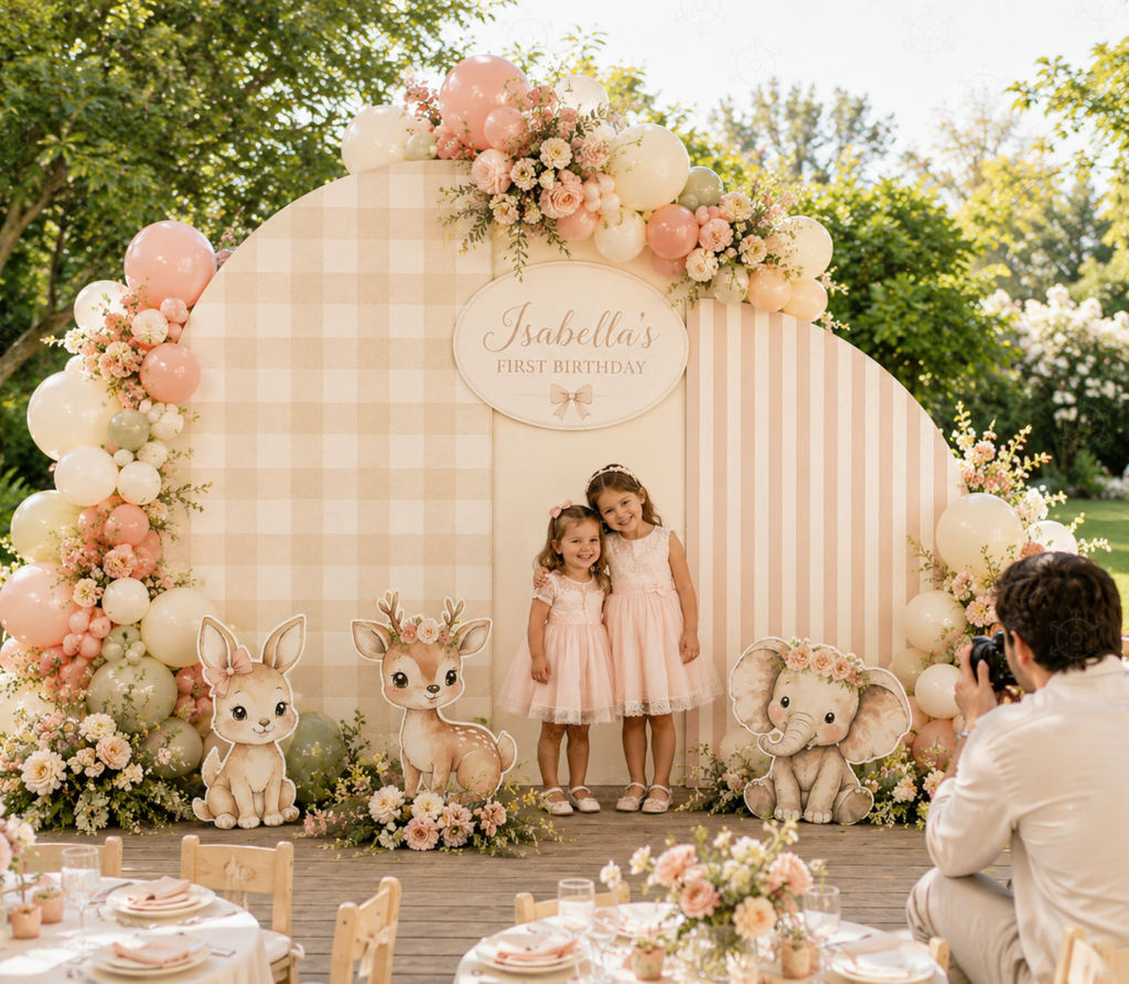 Little animal friends backdrop with neutral arch panels and woodland animal cutouts for a baby celebration
