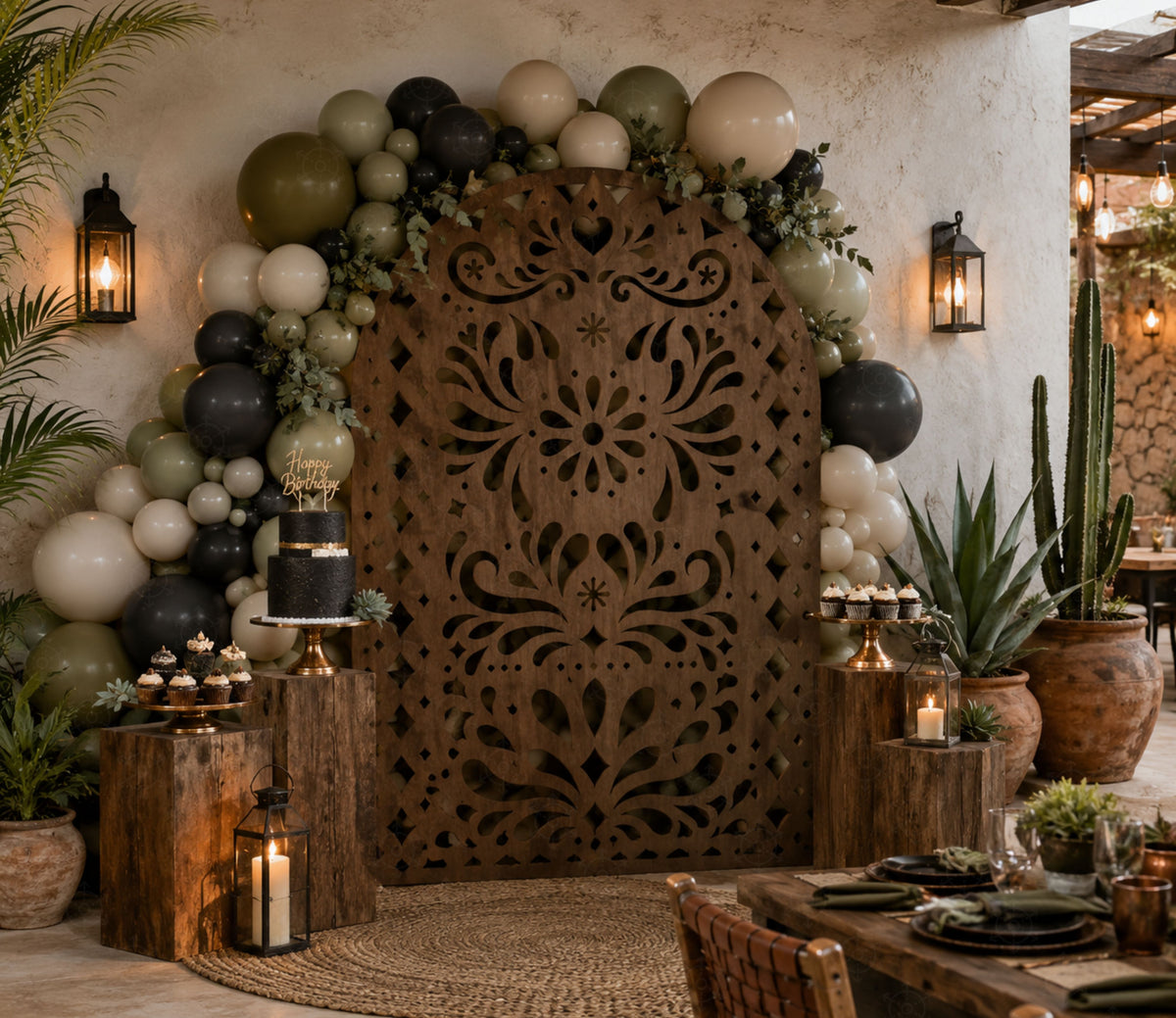Brown Mexican fiesta backdrop with intricate cutout pattern and rustic celebration decor