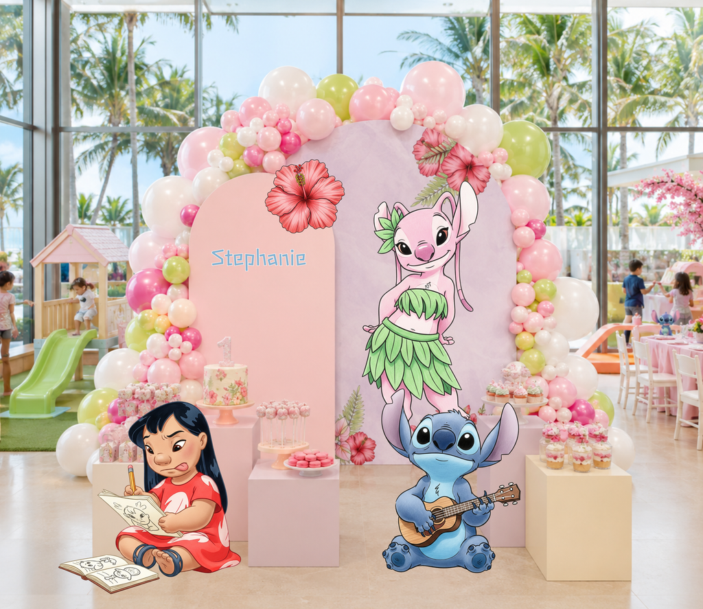 Personalized pink tropical birthday backdrop with floral balloon garland and Hawaiian character cutouts for a girls island themed party.