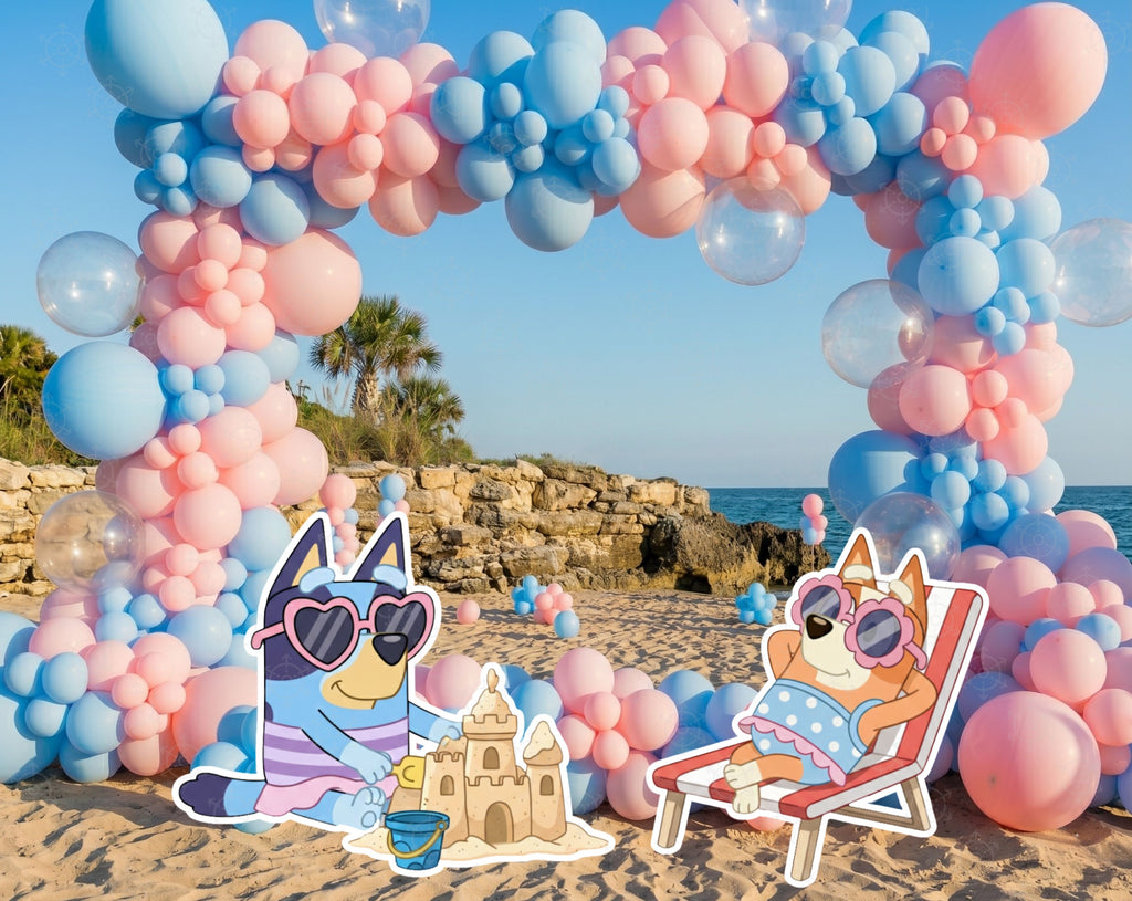 Pool party birthday setup with balloon garlands, pastel backdrop panels and blue puppy character cutouts for a fun summer celebration.