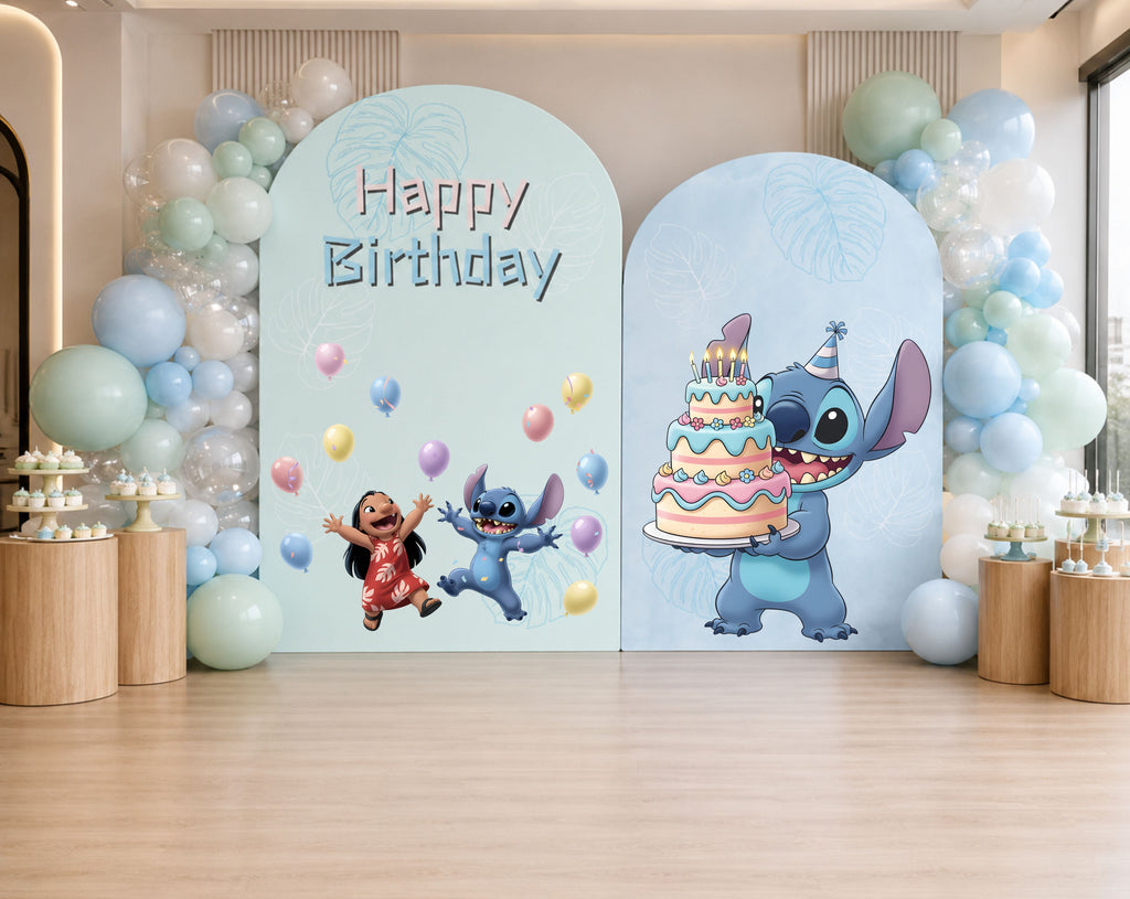Indoor blue alien birthday backdrop with light blue and blush arch panels, balloon decor and kawaii party styling.