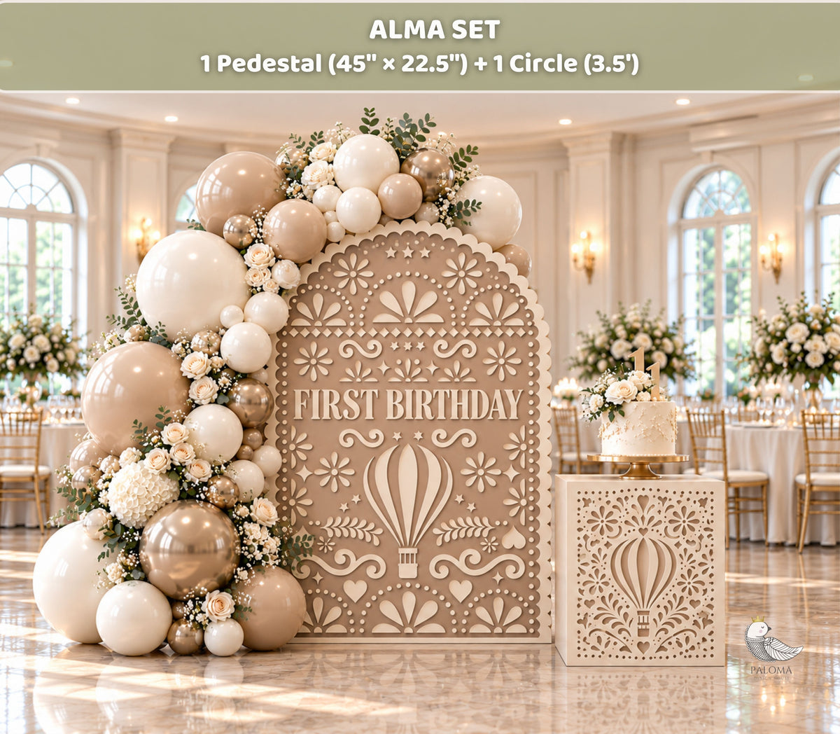 Warm beige papel picado backdrop styled with neutral balloons and floral details for an elegant baptism, christening, or first birthday party.