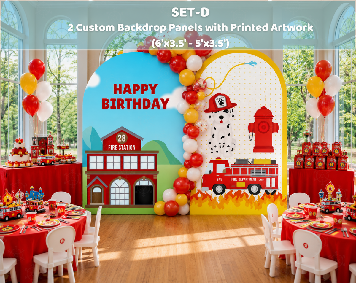 Happy Birthday firefighter backdrop with a rainbow-style arch, red fire station facade, traffic cone detail and fire truck party decor.