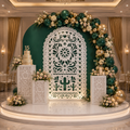 White Papel Picado backdrop with floral arch and matching decorative pedestals