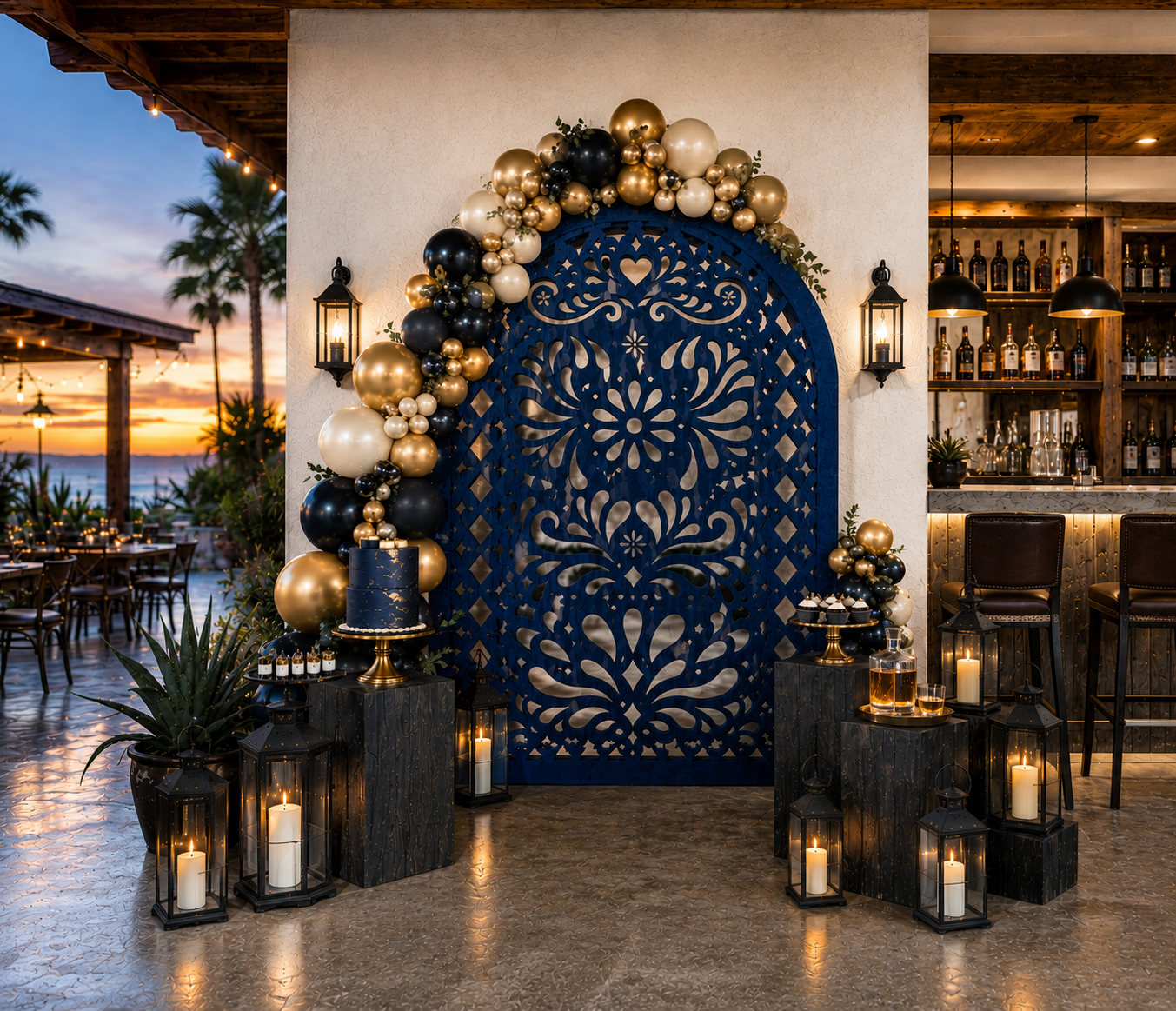 Navy blue Mexican fiesta backdrop with floral cutout design and elegant balloon decor
