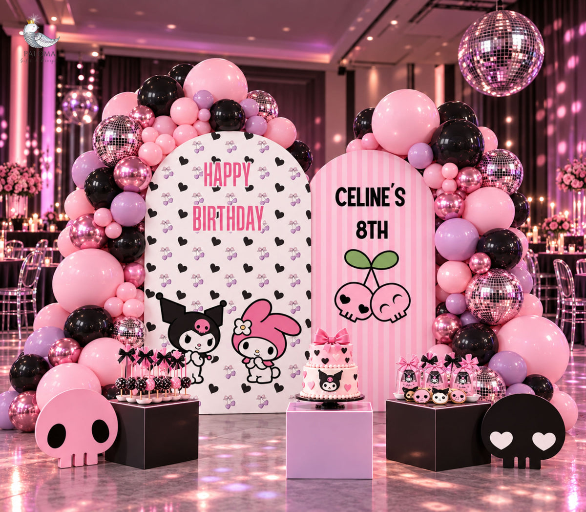 Personalized pink birthday backdrop with black accents, playful character cutouts and coordinated balloon decor for a kids party.