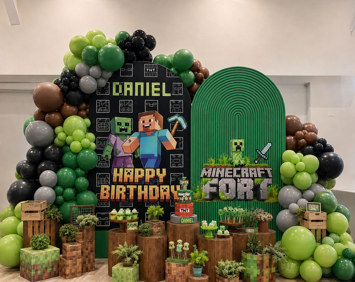 Pixel game birthday backdrop with integrated shelf display, green arched panel, TNT-inspired details and custom gamer party decorations.