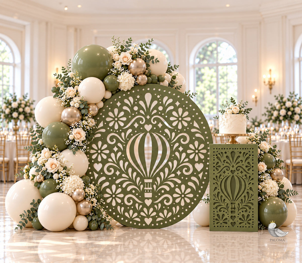 Sage green papel picado backdrop and matching party decor styled with neutral balloons and florals for baptism, first birthday, or baby celebration.