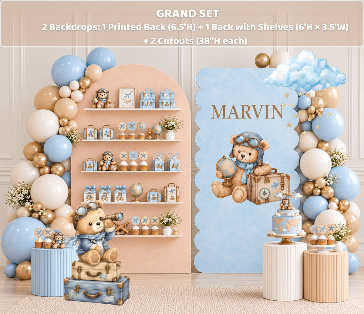 Aviator bear birthday backdrop with blue and neutral shelves, teddy bear details, balloon accents and coordinated first birthday decor.