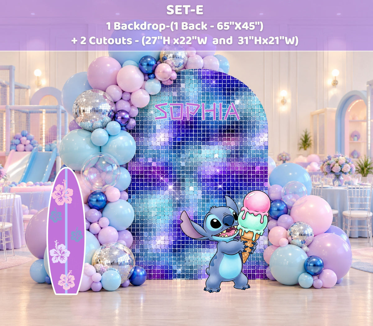 Blue and purple alien birthday backdrop with oversized pastel balloon garland, themed panels and matching character decor for a colorful party.