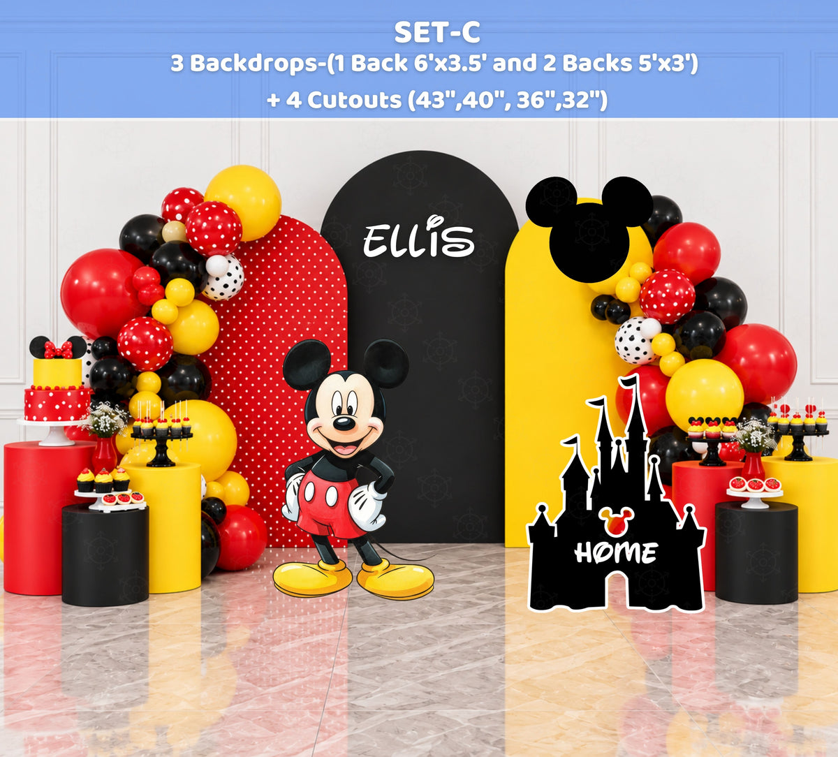 Classic mouse birthday backdrop set with three red black and yellow panels, coordinated balloon garland, personalized name and matching character cutouts.