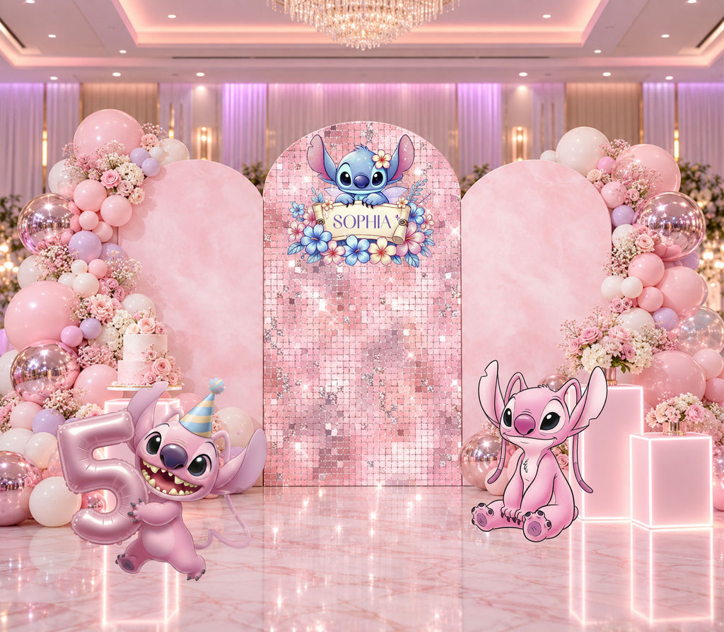 Pink alien birthday backdrop with blush arched panels, floral-inspired details, pastel balloons and coordinated character party decorations.