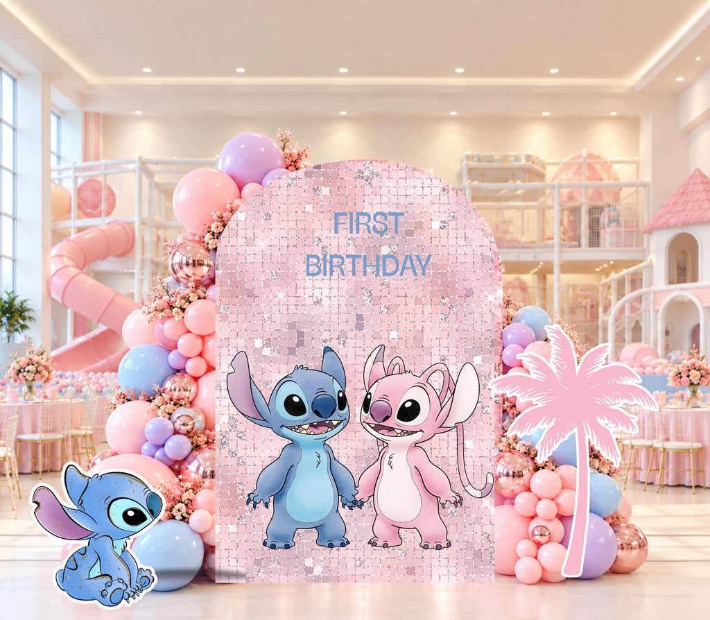 Pink pastel alien birthday backdrop with soft arched panels, balloon decorations and matching blue and pink character cutouts for a kids celebration.